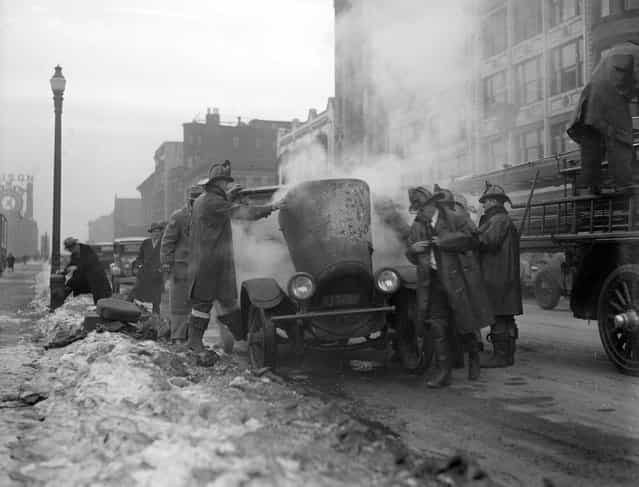 Auto catches fire on Boylston St. Boston, 1929. (Photo by Leslie Jones)