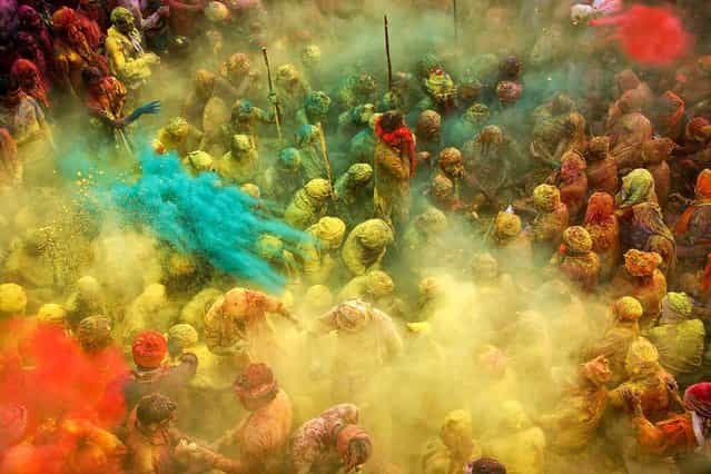 Holi – the festival of colors – is undoubtedly the most fun-filled and boisterous of Hindu festivals. It's an occasion that brings in unadulterated joy and mirth, fun and play, music and dance, and, of course, lots of bright colors! (Photo by Anurag Kumar/2013 Sony World Photography Awards)