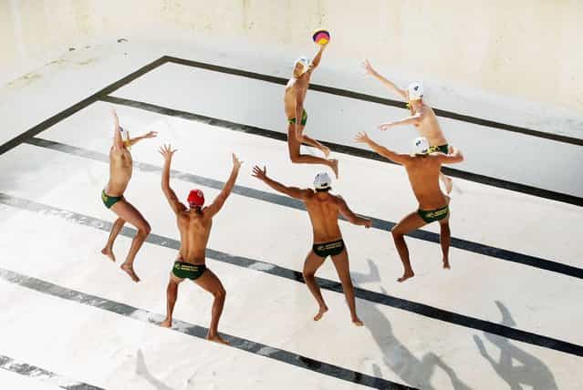 The Australian Mens Olympic Waterpolo Team are photographed in an empty Bondi Icebergs pool at Bondi Beach on May 31, 2012 in Sydney, Australia. The Aussie Sharks as they are known were finalizing their preparations for the 2012 London Olympic Games when I asked them to pose in an famous ocean pool... with the twist of it being empty. (Photo by Ryan Pierse/2013 Sony World Photography Awards)