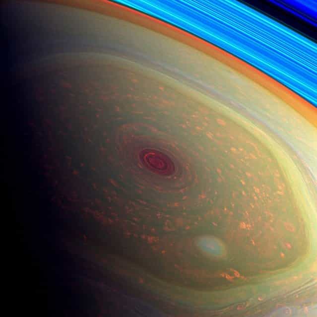 This spectacular, vertigo inducing, false-color image from NASA's Cassini mission highlights the storms at Saturn's north pole.(Photo by NASA/JPL-Caltech/SSI)