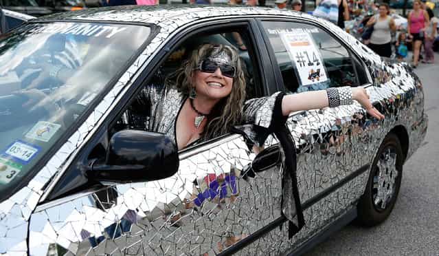 A paradegoer is seen on Allen Parkway during the 26th Annual Houston Art Car Parade on May 11, 2013 in Houston, Texas. (Photo by Scott Halleran/Getty Images)