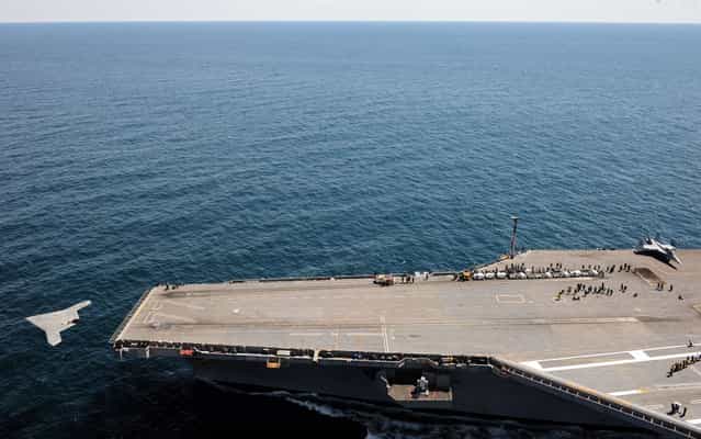 The X-47B makes its catapult launch from USS George H.W. Bush, May 14, 2013. (Photo by MC3 Brian Read Castillo/Marinha dos EUA/AFP Photo)