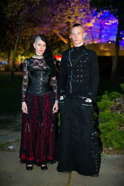 A goth couple poses for pictures at the Agra festival area on the first day of the annual Wave-Gotik Treffen, or Wave and Goth Festival, on May 17, 2013 in Leipzig, Germany. The four-day festival, in which elaborate fashion is a must, brings together over 20,000 Wave, Goth and steam punk enthusiasts from all over the world for concerts, readings, films, a Middle Ages market and workshops. (Photo by Marco Prosch)