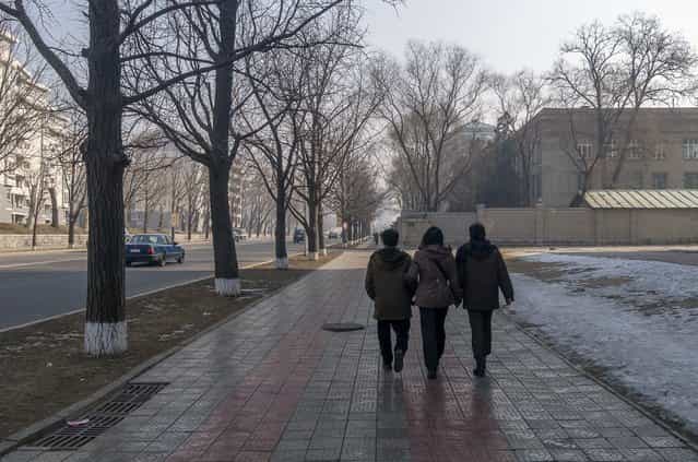 A walk down Mansudae Street, Pyongyang, Feburary 2012. (Eric Testroete)