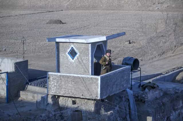 A solider keeps watch, Feburary 2012. (Eric Testroete)