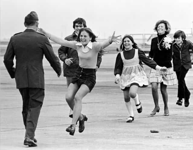 Released prisoner of war Lt. Col. Robert L. Stirm is greeted by his family at Travis Air Force Base in Fairfield, Calif., as he returns home from the Vietnam War, March 17, 1973. In the lead is Stirm's daughter Lori, 15; followed by son Robert, 14; daughter Cynthia, 11; wife Loretta and son Roger, 12. (Photo by Sal Veder/AP Photo)