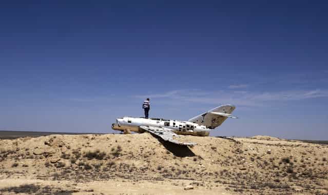 The shell of a MiG-15 fighter in the Karakum desert. Unlike most of the Central Asian republics, Soviet relics like this one have mostly disappeared from Turkmenistan's cities. (Photo by Amos Chapple via The Atlantic)