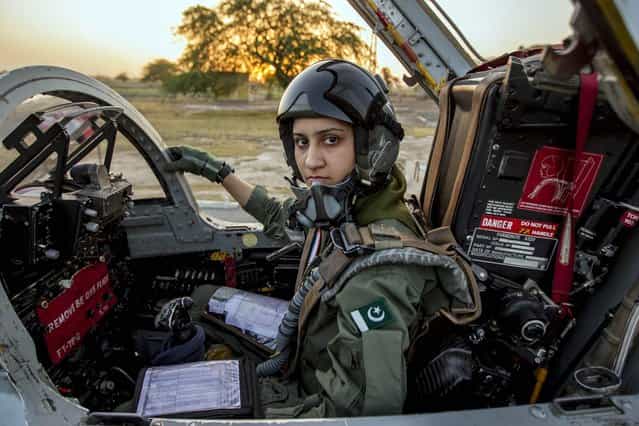 Ayesha Farooq, 26, Pakistan's only female war-ready fighter pilot, poses for photograph as she sits in a cockpit of a Chinese-made F-7PG fighter jet at Mushaf base in Sargodha, north Pakistan June 6, 2013. (Photo by Zohra Bensemra/Reuters)