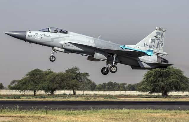 A JF-17 Thunder fighter jet of the Pakistan Air Force takes off from Mushaf base in Sargodha, north Pakistan June 7, 2013. The plane is co-developed by the Aviation Industry Corp of China and the Pakistan Aeronautical Complex, according to local media. (Photo by Zohra Bensemra/Reuters)
