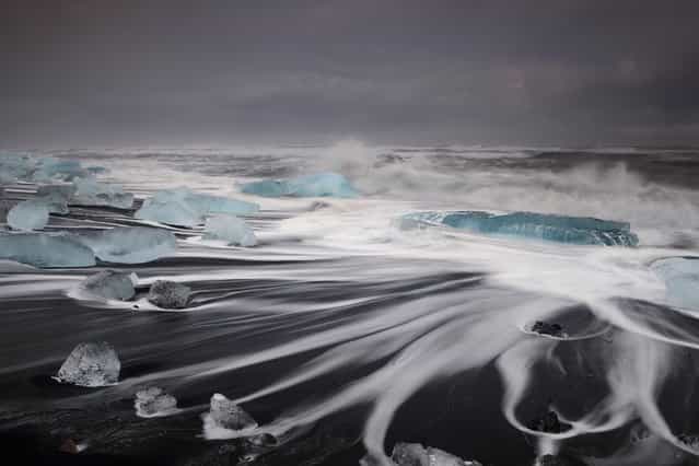 [The Octopus]. This is a one-second exposure of the trails left by a crashing wave over small icebergs on Jökulsárlón beach; I think it looks a bit like an octopus. Location: Jökulsárlón, South-East Iceland. (Photo and caption by Sophie Carr/National Geographic Traveler Photo Contest)