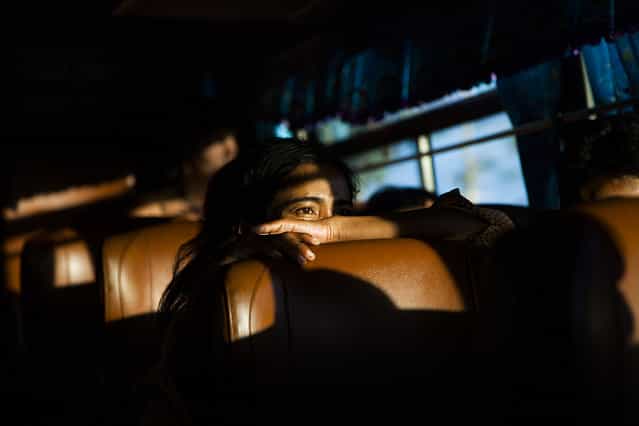 [Day dreaming]. This picture was taken in Cambodia during a bus ride. A woman who day dreams. I see bus rides as the best way to meditate. (Photo and caption by Stylianos Papardelas/National Geographic Traveler Photo Contest)