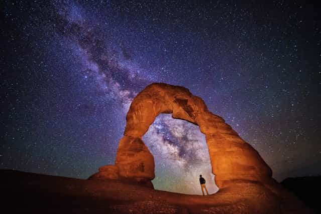 [Night at the Arch]. This is a self portrait I made while photographing the night sky at Delicate Arch in Utah. (Photo and caption by Max Seigal/National Geographic Traveler Photo Contest)