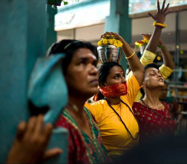 [Devotees]. Devotees performing their rituals during the Thaipusam festival held at Malaysia. It is a Hindu festival celebrated mostly by the Tamil community on the full moon in the Tamil month usually during the month of January to February. (Photo and caption by Mervyn Dublin/National Geographic Traveler Photo Contest)