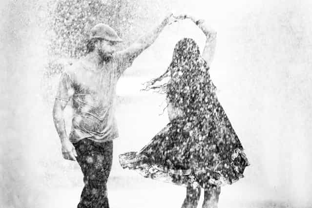 [Dancing Through Raindrops]. A couple dancing dancing through raindrops. Location: Belo Horizonte, MG, Brazil. (Photo and caption by Pedro Müller/National Geographic Traveler Photo Contest)