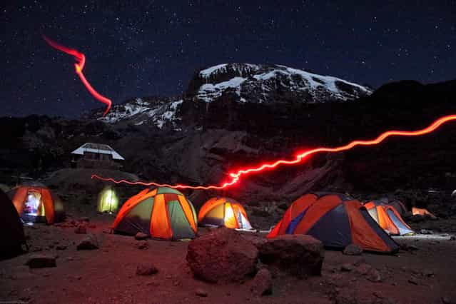 [Barranco Camp at night, Kilimanjaro]. Barranco camp was our third on our 7 day hike to the summit of Mount Kilimanjaro. Taken after dinner while the group was getting ready to get a good nights rest before tackling infamous Barracno Wall in the morning. Location: Mount Kilimanjaro, Tanzania. (Photo and caption by Trevor Booth/National Geographic Traveler Photo Contest)