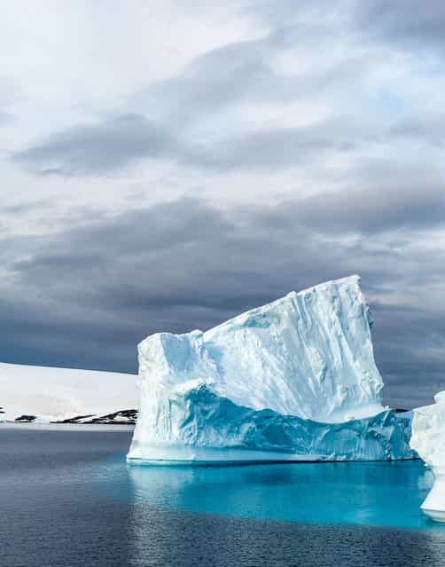 [Iceberg beauty]. Brilliant color reflected in Iceberg. Location: Antartica. (Photo and caption by Nancy Dowling/National Geographic Traveler Photo Contest)