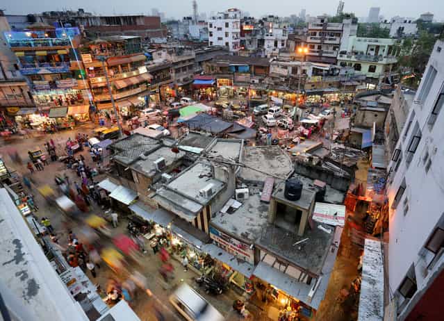 [Main Bazaar in New Delhi, India]. This is a long exposure, evening look at Main Bazaar in Paharganj. (Photo and caption by Edward Graham/National Geographic Traveler Photo Contest)