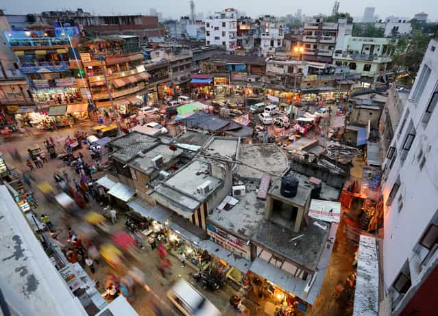 [Main Bazaar in New Delhi, India]. This is a long exposure, evening look at Main Bazaar in Paharganj. (Photo and caption by Edward Graham/National Geographic Traveler Photo Contest)