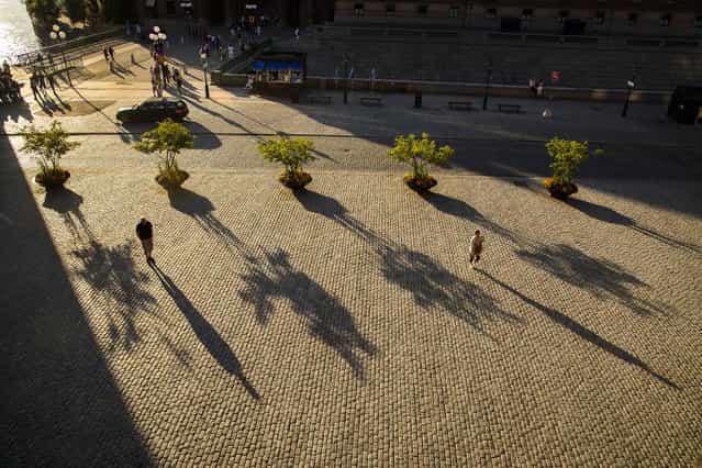 [Long Shadows in Stockholm]. Sunset on a square in Stockholm. Location: Stockholm, Sweden. (Photo and caption by James Kobacker/National Geographic Traveler Photo Contest)