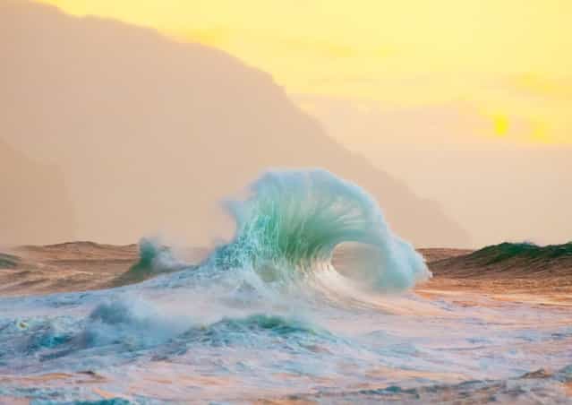 [Green Glow]. Kauai is a wild and magical place. It invokes a sense of freedom, appreciation, and love. At this particular beach waves rebound and crash off of lava rocks and cliffs forming into interesting shapes. Location: Kauai, Hawaii. (Photo and caption by Lace Andersen/National Geographic Traveler Photo Contest)