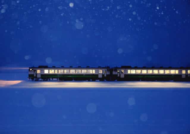 [Travel of galactic railroad]. Tadami line railway run through the Aizu district in Fukushima prefecture.Aizu is famous for heavy snow. Location: Aizu, Fukushima, Japan. (Photo and caption by Hideyuki Katagiri/National Geographic Traveler Photo Contest)