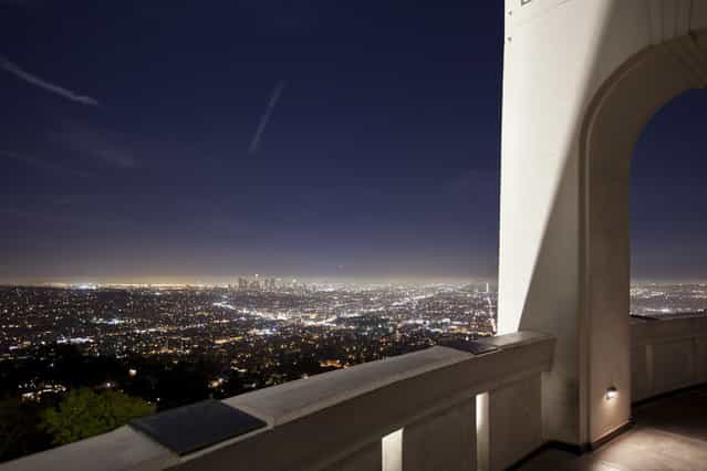 [LA Moon Light]. I took this from Griffith Park Observatory around 9:30pm they sky looked just perfect for me and some sparkly stars here and there and a little bit of clouds and marine layer over the city just a typical Los Angeles night . (Photo and caption by John Chimon/National Geographic Traveler Photo Contest)