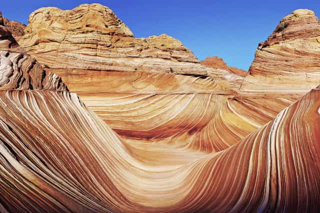 [The Wave]. I was one of the lucky few that have seen this amazing rock formation, only 20 permits are issued a day and there is an actual lottery to win the permit, 10 are issued online and 10 are issued at the Paria Canyon rangers station. This rock formation is Navajo Sandstone which has been created by the natural elements over eons. It is one of the most beautiful things that I have ever seen and I felt privileged that I had the chance to do so. Location: North Coyote Buttes, Arizona, USA. (Photo and caption by Miriam Perritt/National Geographic Traveler Photo Contest)