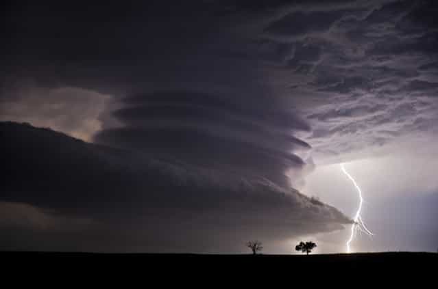 [Stacked Supercell with Lightning]. This huge mesocyclone supercell was near the Nebraska / Kansas border on the night of June 22nd, 2012. What a stunning structure! (Photo and caption by Jennifer Brindley/National Geographic Traveler Photo Contest)