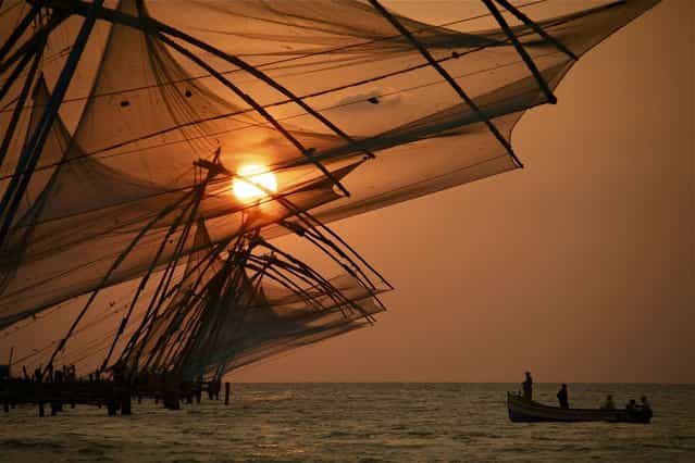 [Chinese nets at sunset in Fort Kochin]. Chinese nets at sunset in Fort Kochin, India. (Photo and caption by Wylda Bayron/National Geographic Traveler Photo Contest)