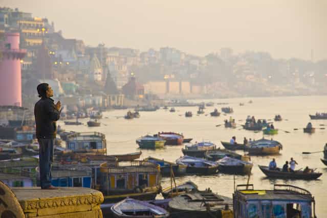 [Morning at Varanasi]. The Ganges is the most sacred river, while Varanasi is regarded as the holy city to Hindus. Everyday from dawn to dusk, people comes here to pray. (Photo and caption by Ng Hock How/National Geographic Traveler Photo Contest)