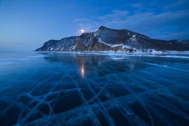 [Uzury/Ice tracery]. Russia, Baikal lake, Olkhon island, near the small settlement Uzury (Uzu:ri). This name spells almost like russian word [uzory] (uzo:ri), one of the meanings is [tracery] – the tracery of Baikal ice, cleanest in the world. March, early morning, –25C. (Photo and caption by Alexey Kharitonov/National Geographic Traveler Photo Contest)
