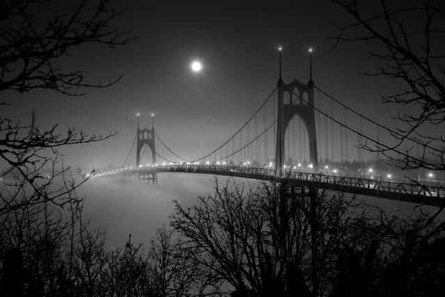 [Haunting moonrise]. A full moon over St. John's bridge in Portland, Oregon. (Photo and caption by Fred An/National Geographic Traveler Photo Contest)