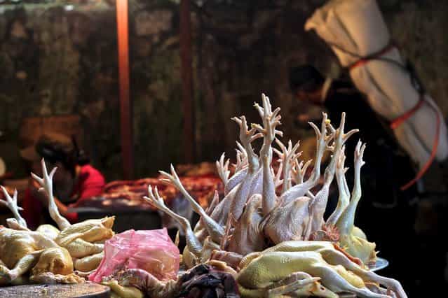 [Vietnamese Market]. There is something graceful yet eerie about the way these chicken feet are sticking straight up in the air. This was taken as I walked through the local food market. Location: Sapa, Vietnam. (Photo and caption by Kayla Beiler/National Geographic Traveler Photo Contest)