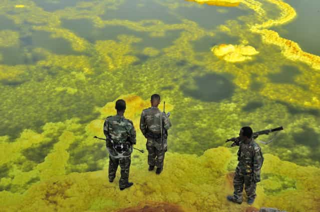 [Dallol volcano]. During the expedition to Dallol volcano, we were constantly accompanied by ethiopian soldiers because of the proximity to the border with Eritrea. Location: Ethiopia, Danakil desert, East rift Depression. (Photo and caption by Michel Hanse/National Geographic Traveler Photo Contest)