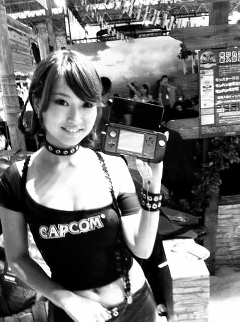 [Capcom girl peddling a 3DS Slide Pad. Tokyo, 2011]. (Photo by Edmund Yeo)