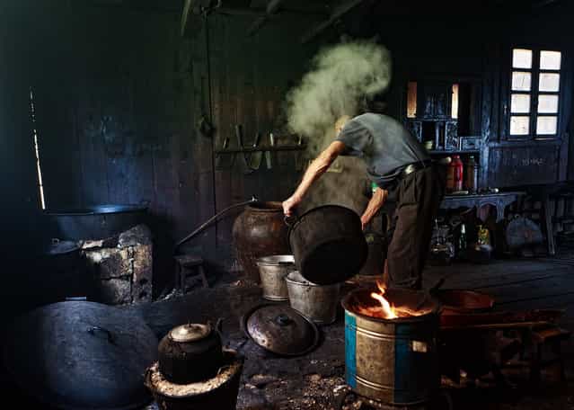 [Working on Tofu]. Man Making Tofu at Longseng village Guilin, China. (Photo and caption by Helminadia Jabur/National Geographic Traveler Photo Contest)