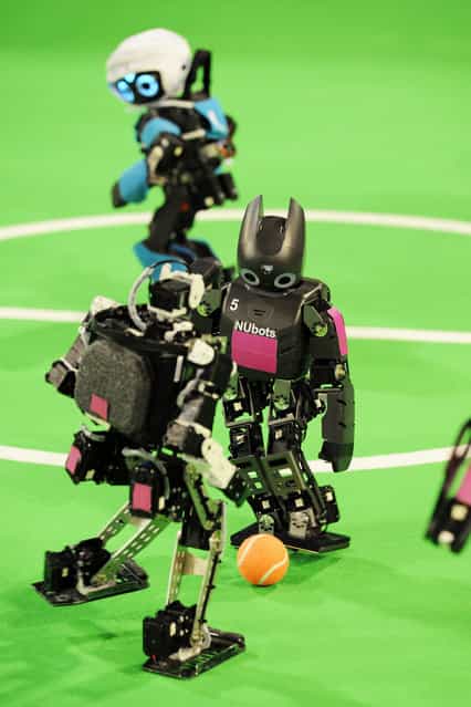 Match for the Humanoid teen size league at RoboCup 2013 in Eindhoven (NL). (Photo by Bart van Overbeeke)