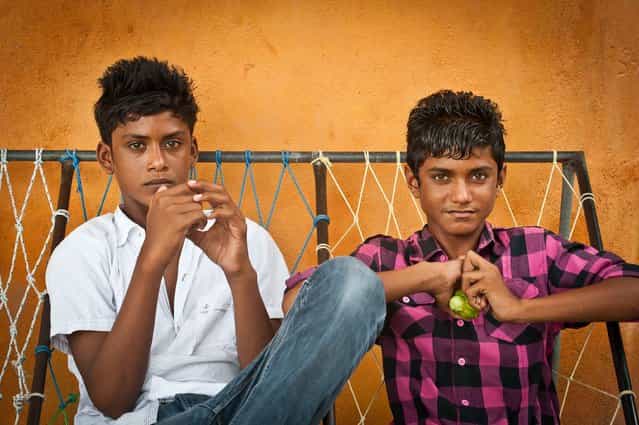 [Maldivian Teens]. These boys were relaxing on street seats in a small island town in the South Male Atoll. (Photo and caption by Jason Wajzer/National Geographic Traveler Photo Contest)