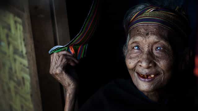 [Old Smile]. One of the crafts which Lombok is famous for is textile weaving. This old lady was shot at the the small, traditional village that produces these unique and beautiful craftsmanship. Lombok, Indonesia. (Photo and caption by Rio Murti/National Geographic Traveler Photo Contest)
