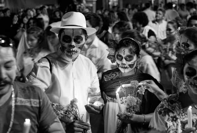 [Día de los Muertos]. It was the first time being in a [Day of the Dead] parade. It is interesting to see how Mexicans celebrate death rather than fear it. Location: Mérida, México. (Photo and caption by Patrick Chan/National Geographic Traveler Photo Contest)