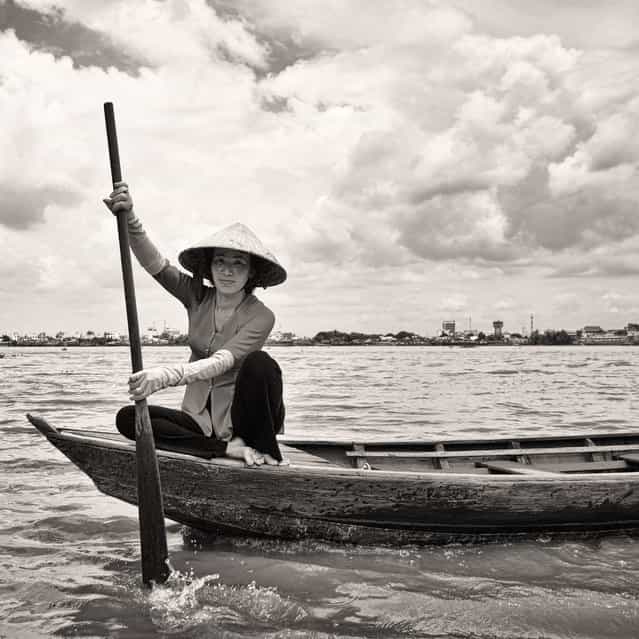 [Mekong Lady]. Very nice posing of Mekong lady come across my boat... Love her smile very much. Location: Mekong River, Ho Chi Minh. (Photo and caption by Suhaimi Mat Isa/National Geographic Traveler Photo Contest)