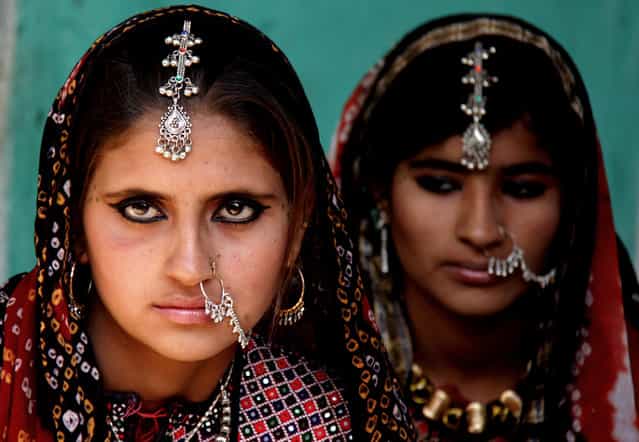 [Raw Beauty]. Two raw Beauties from a village could put any model to shame. Location: Bhuj Gujarat, India. (Photo and caption by Porus Khareghat/National Geographic Traveler Photo Contest)