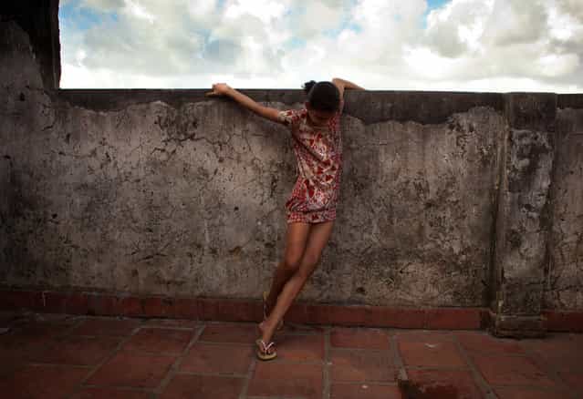 [Lighter than her Life]. Christiane, a child of the Roofless Movement in Salvador Brazil. A beautiful spirit living a life not hers by choice, but she brings love and light to all around her. (Photo and caption by Geralyn Shukwit/National Geographic Traveler Photo Contest)