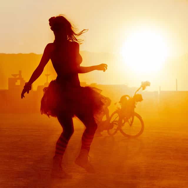 [Dancing in the dust at sunset]. (Photo and caption by Ian Brewer)