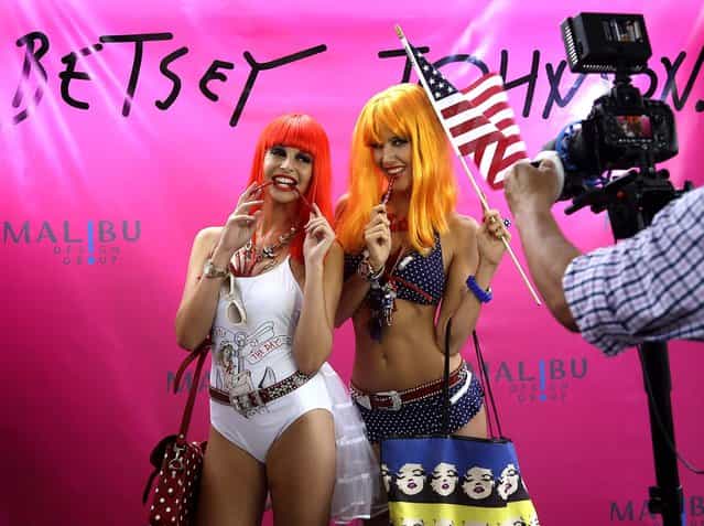 Models pose during a Betsey Johnson swimwear show. (Photo by Lynne Sladky/Associated Press)