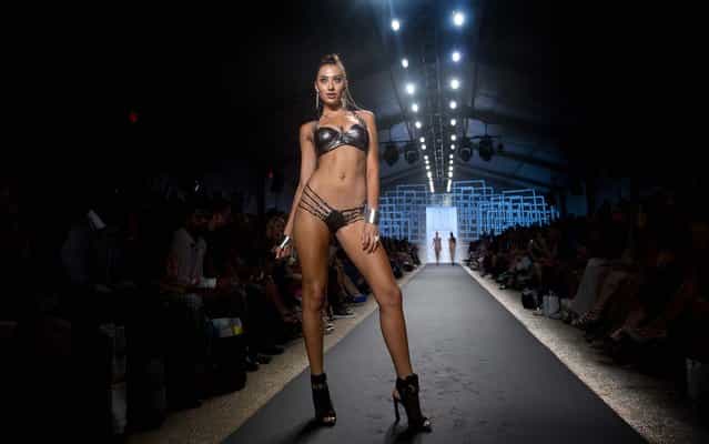 A model walks the runway during the Beach Bunny show. (Photo by J. Pat Carter/Associated Press)