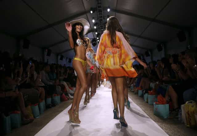 Models walk the runway during the Luli Fama show at Mercedes-Benz Fashion Week Swim, Sunday, July 21, 2013, in Miami Beach, Fla. (Photo by Lynne Sladky/AP Photo)