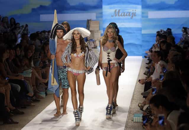 Models walk the runway during the Maaji show at the Mercedes-Benz Fashion Week Swim, Sunday, July 21, 2013, in Miami Beach, Fla. (Photo by Lynne Sladky/AP Photo)