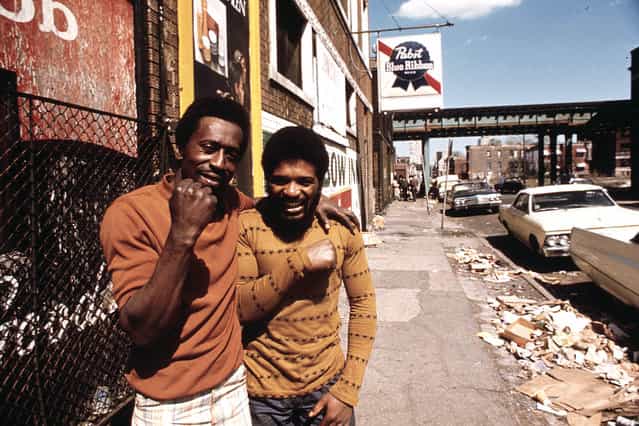 Men pose on a South Side street, May 1974. (Photo by John H. White/NARA via The Atlantic)