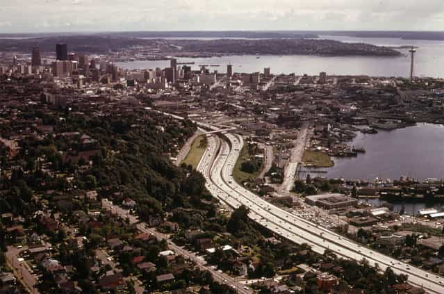The City of Seattle and Interstate Highway 5, with Elliott Bay at right, seen in June of 1973. (Photo by Doug Wilson/NARA via The Atlantic)